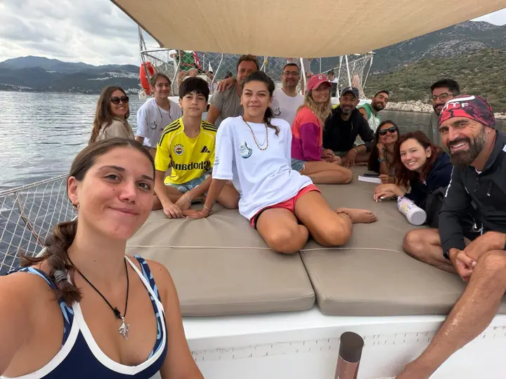 Participants relaxing on deck between dives